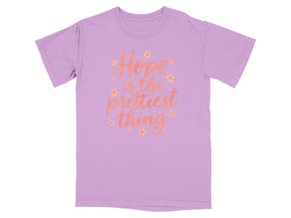 Lavender t-shirt with "Hope is the prettiest thing" text and floral accents.