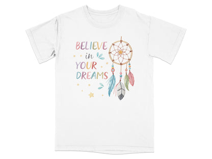 White t-shirt with "Believe in Your Dreams" text and colorful dreamcatcher.