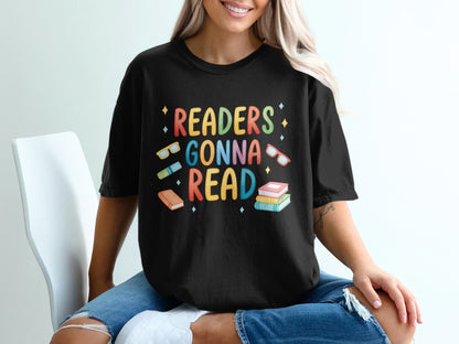 Black t-shirt with "Readers Gonna Read" and colorful books and glasses design.