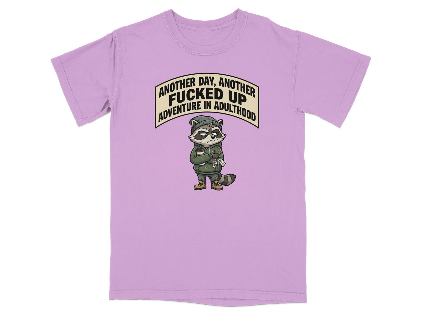T-shirt with raccoon graphic and text "Another day, another fucked up adventure in adulthood."