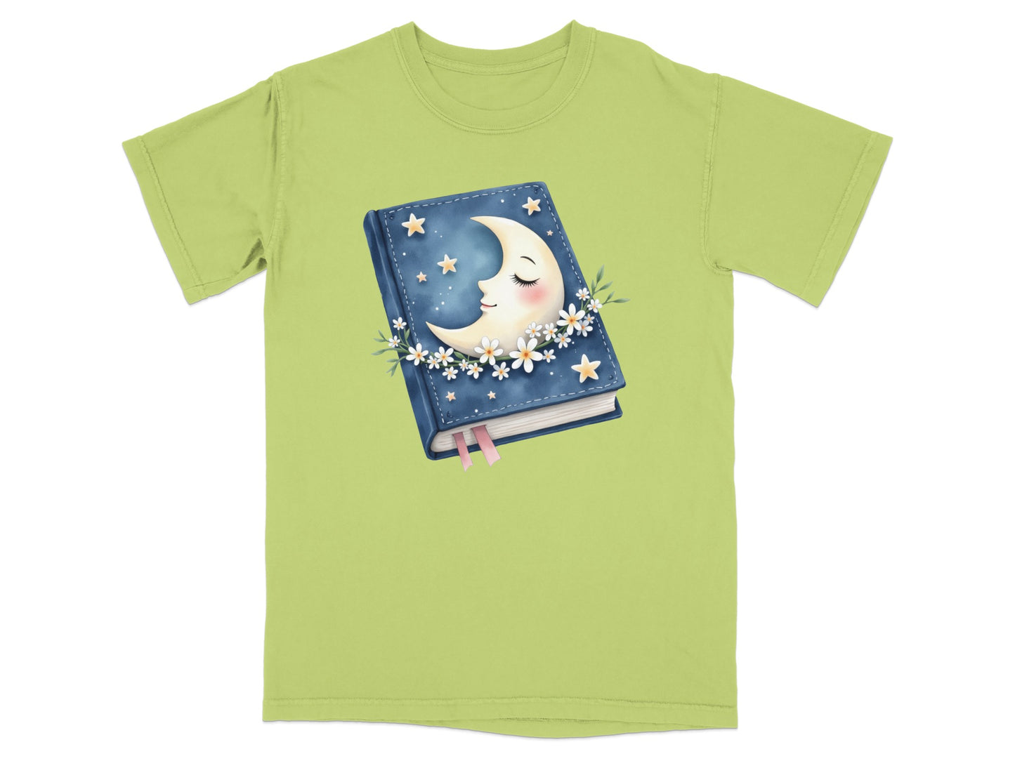 Green t-shirt with a book featuring a crescent moon and stars design.