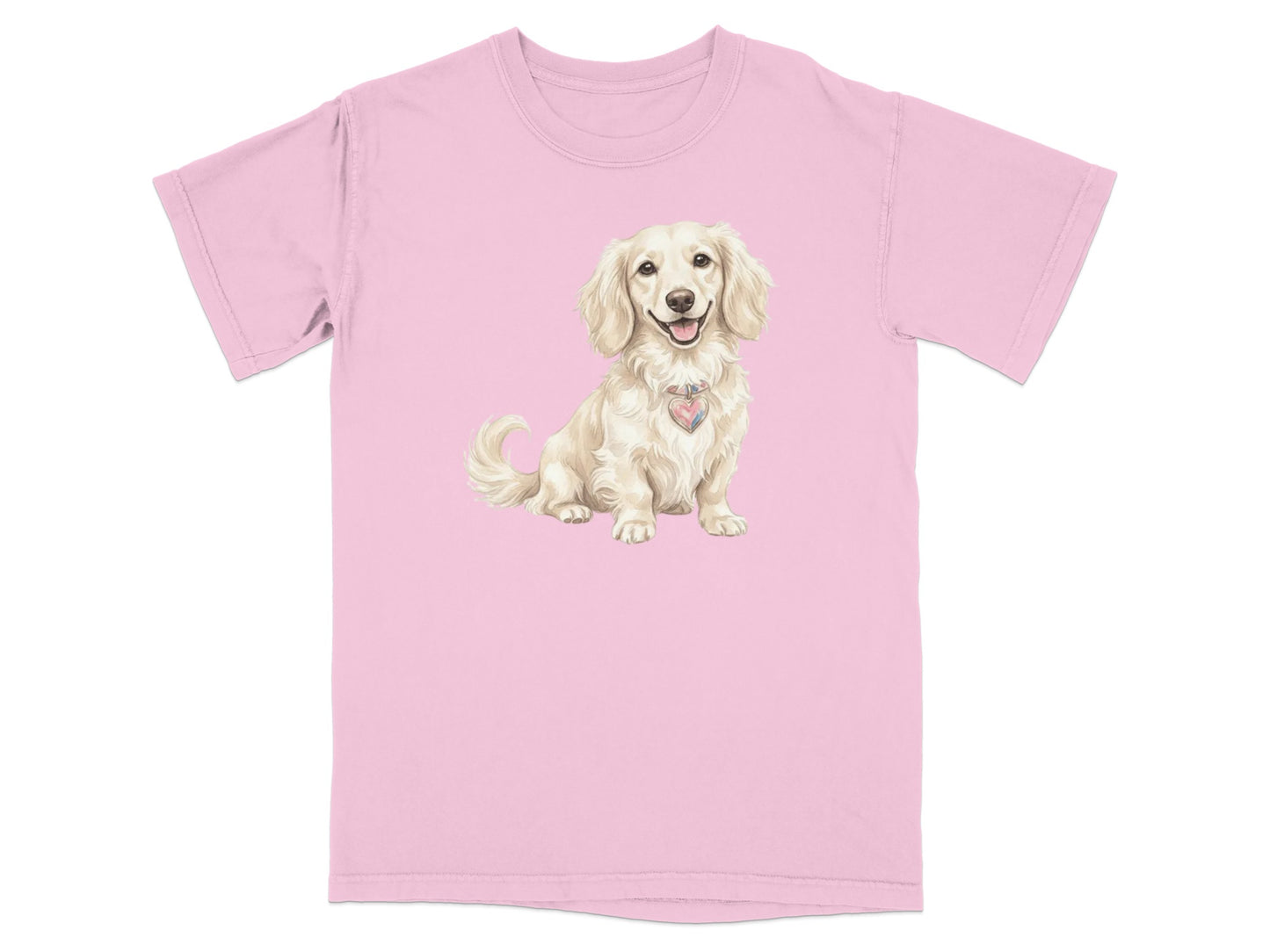 Pink t-shirt with a cream dachshund wearing a heart-shaped charm.