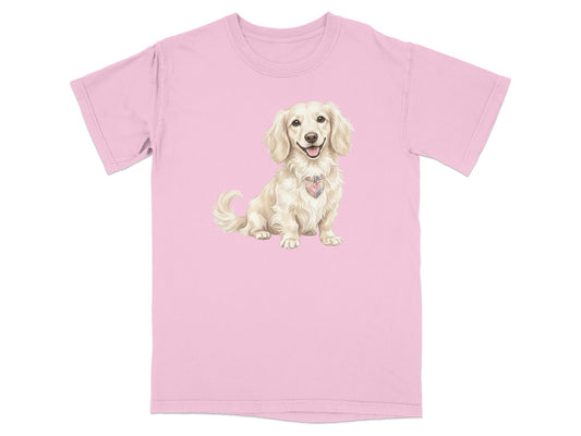 Pink t-shirt with a cream dachshund wearing a heart-shaped charm.