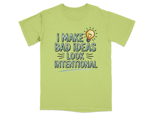 Light green t-shirt with "I make bad ideas look intentional" text and a lightbulb.