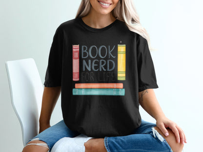 Black t-shirt with "BOOK NERD FOR LIFE" and stacked colorful books graphic.