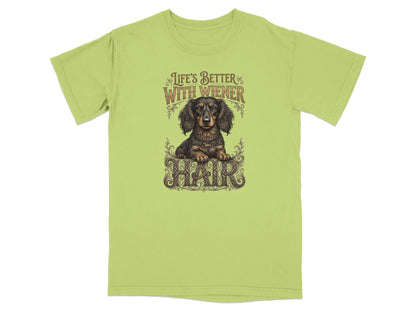 Green t-shirt with "Life's Better With Wiener Hair" and dachshund graphic.