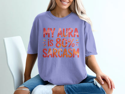 Purple t-shirt with "MY AURA IS 80% SARCASTIC" in orange and yellow text.