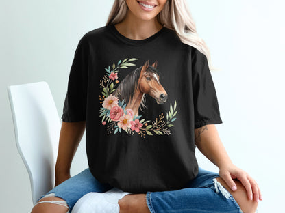 Black t-shirt with horse head surrounded by flowers and leaves.