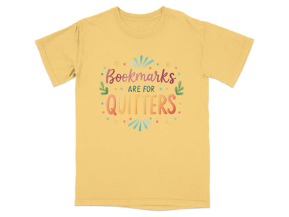 Yellow t-shirt with "Bookmarks are for quitters" text and colorful decorative elements.