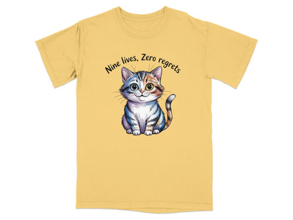 Yellow t-shirt with a cartoon cat and "Nine lives, Zero regrets" text.