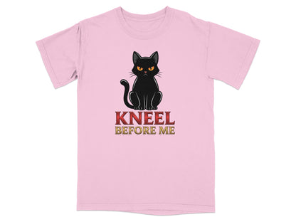 Pink t-shirt with black cat and text "KNEEL BEFORE ME".