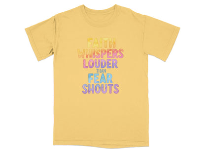 Yellow t-shirt with "FAITH WHISPERS LOUDER THAN FEAR SHOUTS" in colorful text.