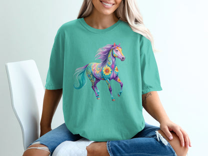 Teal t-shirt with a vibrant, colorful, stylized horse graphic.