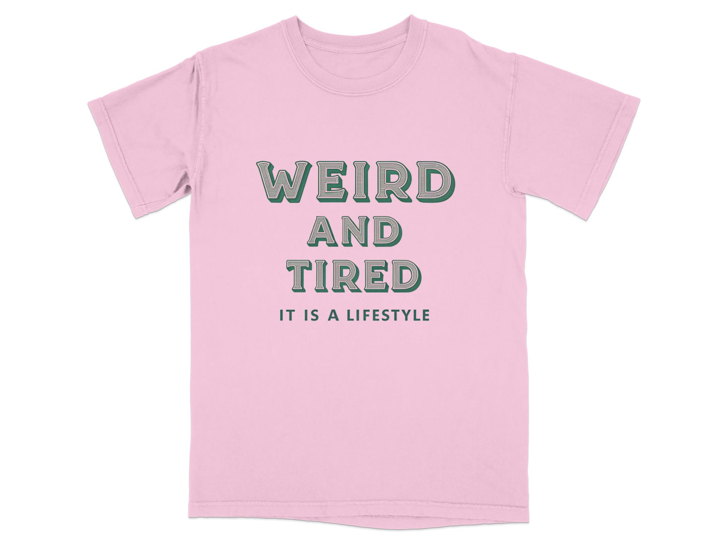 Pink t-shirt with "WEIRD AND TIRED IT IS A LIFESTYLE" text.