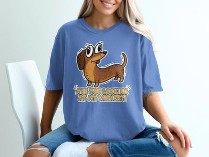 Brown cartoon dachshund on blue t-shirt with text "ARE YOU LOOKING AT MY WIENER?".