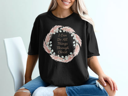 Black t-shirt with floral wreath graphic and "I Can Do All Things Through Christ" text.