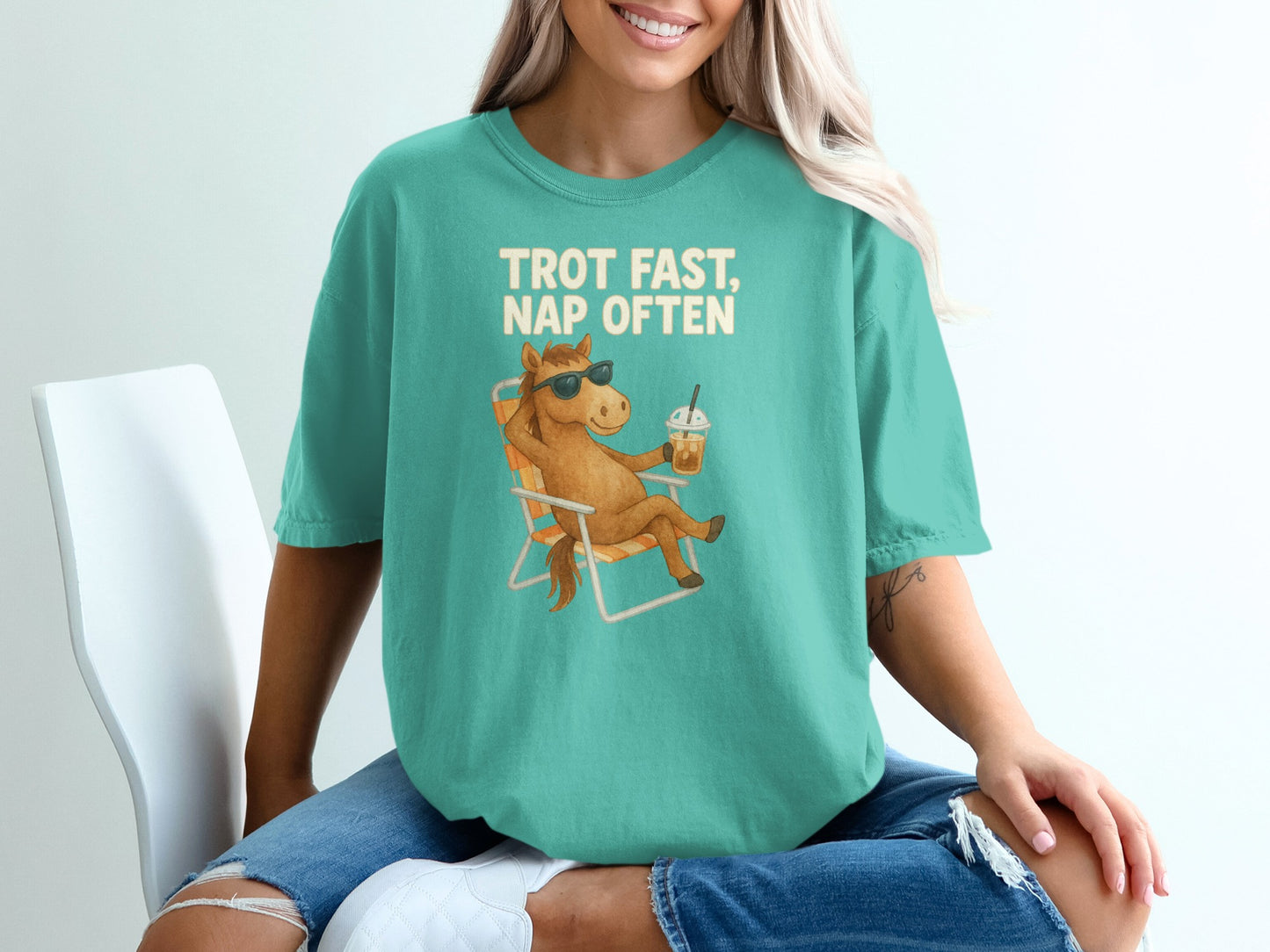 Teal t-shirt with "TROT FAST, NAP OFTEN" and a horse in a lounge chair.