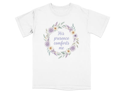 White t-shirt with a floral wreath and "His presence comforts me" text.