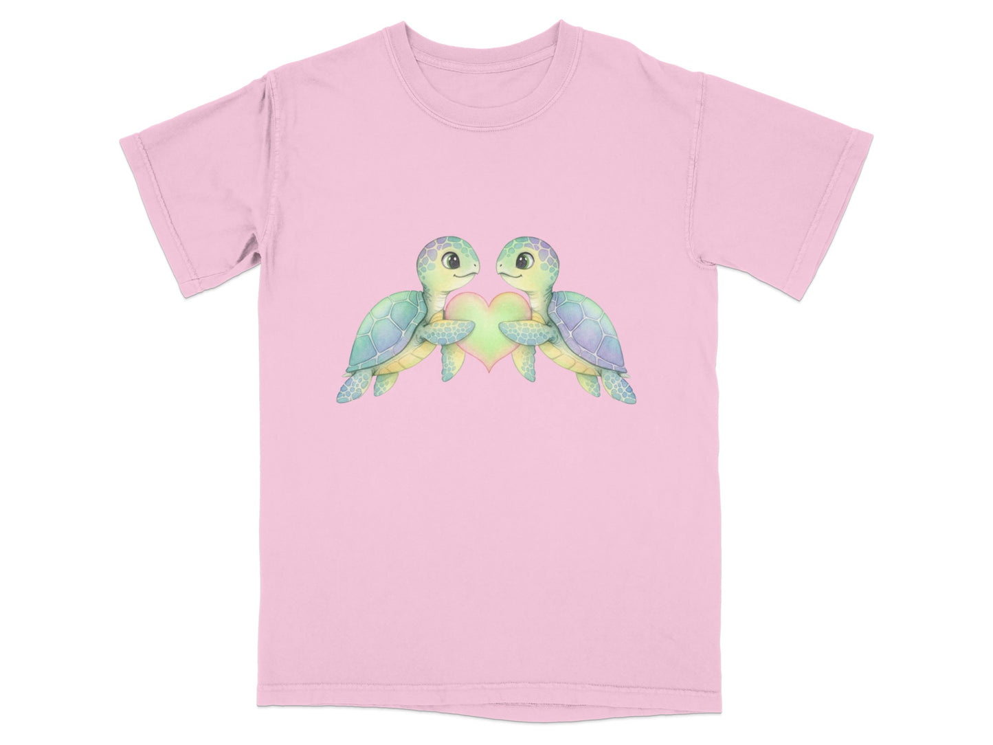 Two sea turtles hold a heart, printed on a pink t-shirt.