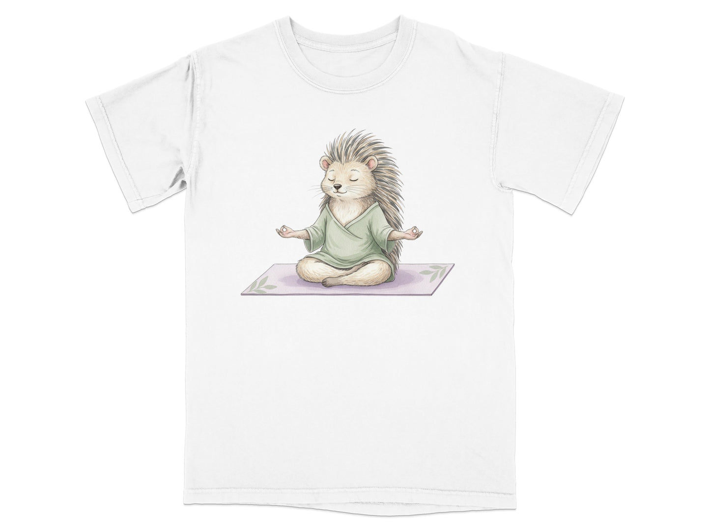 White t-shirt with a watercolor illustration of a hedgehog meditating on a mat.