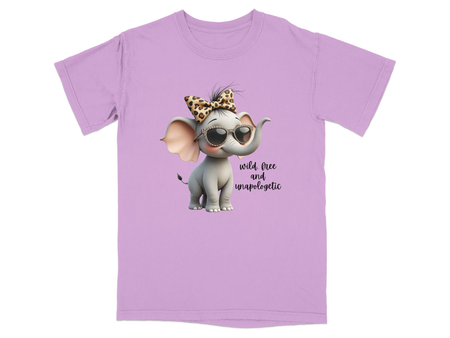 Lilac t-shirt with a cartoon elephant wearing sunglasses and a leopard print bow, text reads "wild, free and unapologetic".