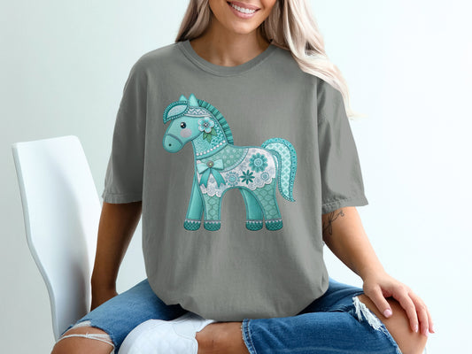 Blue and white patterned horse graphic on a grey t-shirt.