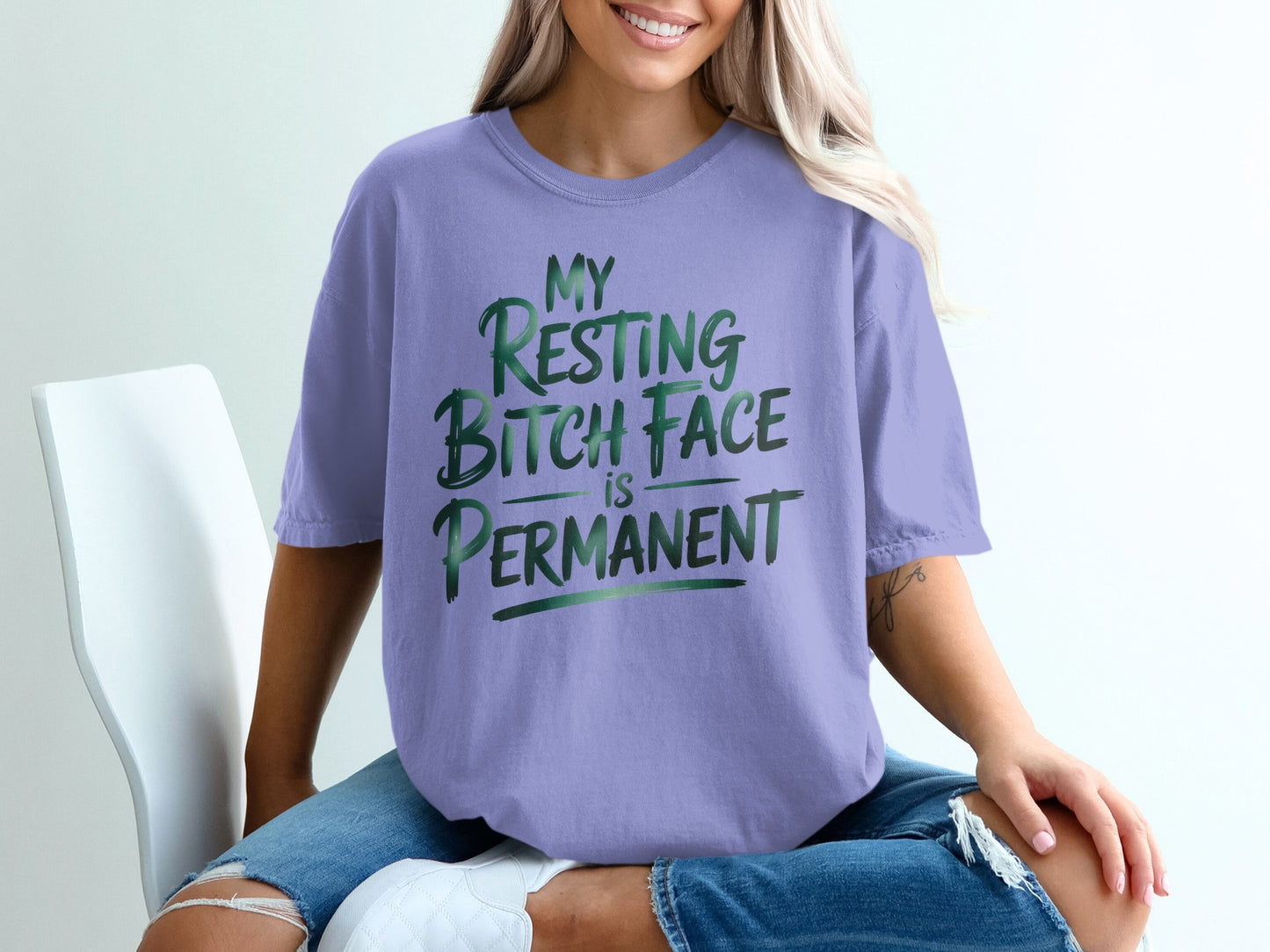 Purple t-shirt with "My Resting Bitch Face is Permanent" graphic text.