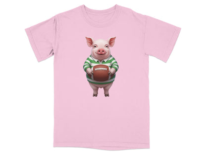 Pink t-shirt with cartoon pig holding a rugby ball.