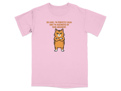 Pink t-shirt with cartoon cat and text "OH LOOK, I'M PERFECTLY CALM. AND I'M FASCINATED BY YOUR ARGUMENT."