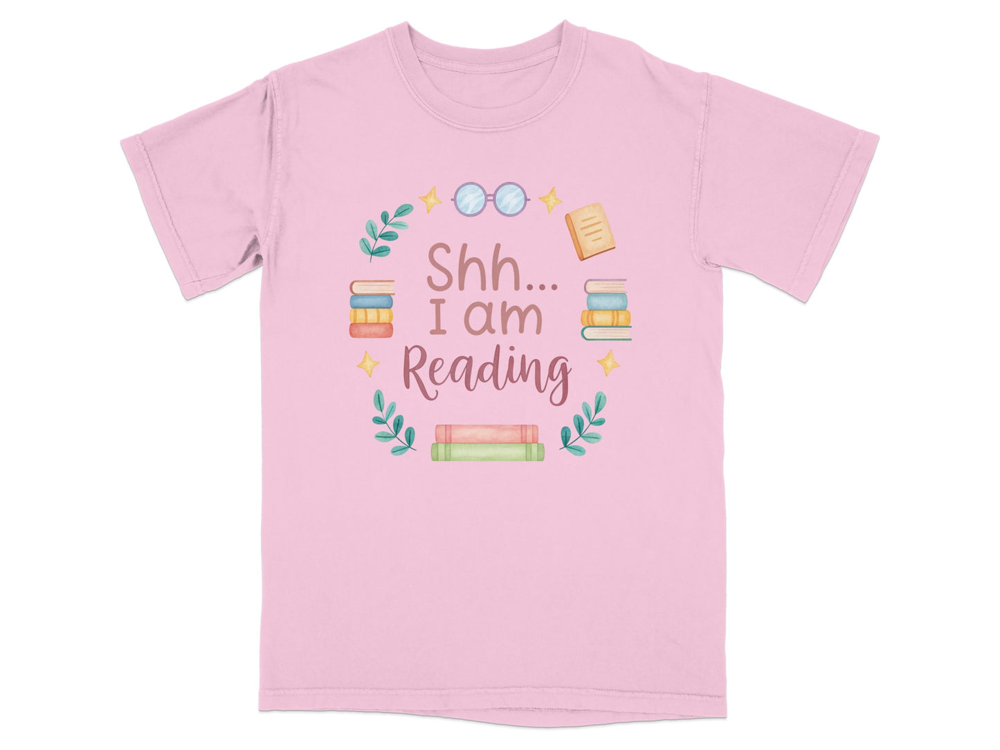 Pink t-shirt with "Shh... I am Reading" and stacks of books.