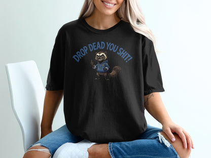 Black t-shirt with raccoon graphic and text "DROP DEAD YOU SH*T!".
