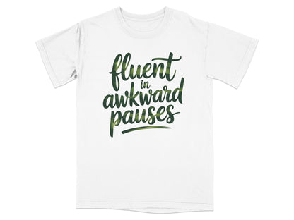 White t-shirt with "fluent in awkward pauses" in green stylized text.
