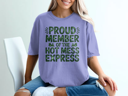 Purple t-shirt with green text that reads "PROUD MEMBER OF THE HOT MESS EXPRESS".