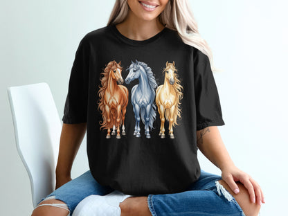 Three horses, two light brown and one golden, stand side-by-side.