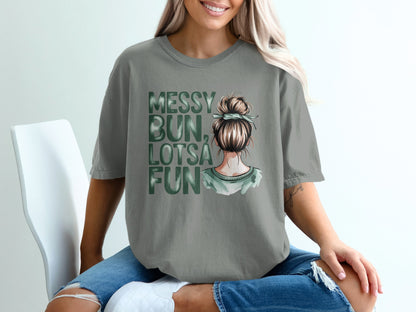 Grey t-shirt with "Messy Bun, Lotsa Fun" text and illustration of woman's head.