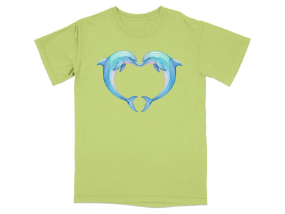 Two dolphins facing each other, forming a heart shape, on a light green t-shirt.