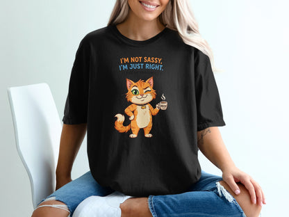 Black t-shirt with orange cat holding coffee and text "I'm not sassy, I'm just right."