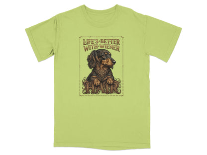 T-shirt featuring a brown dachshund with ornate border and "Life's Better With Wiener Hair" text.
