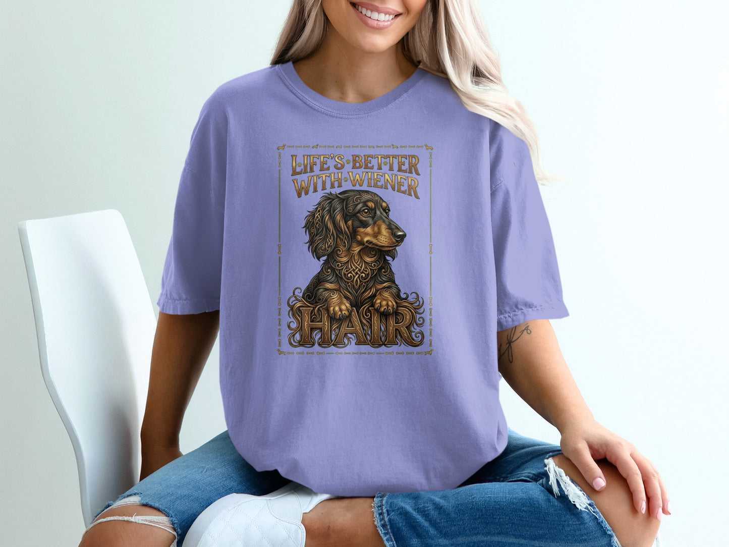 Purple t-shirt with a dachshund and "Life's Better With Wiener Hair" text.