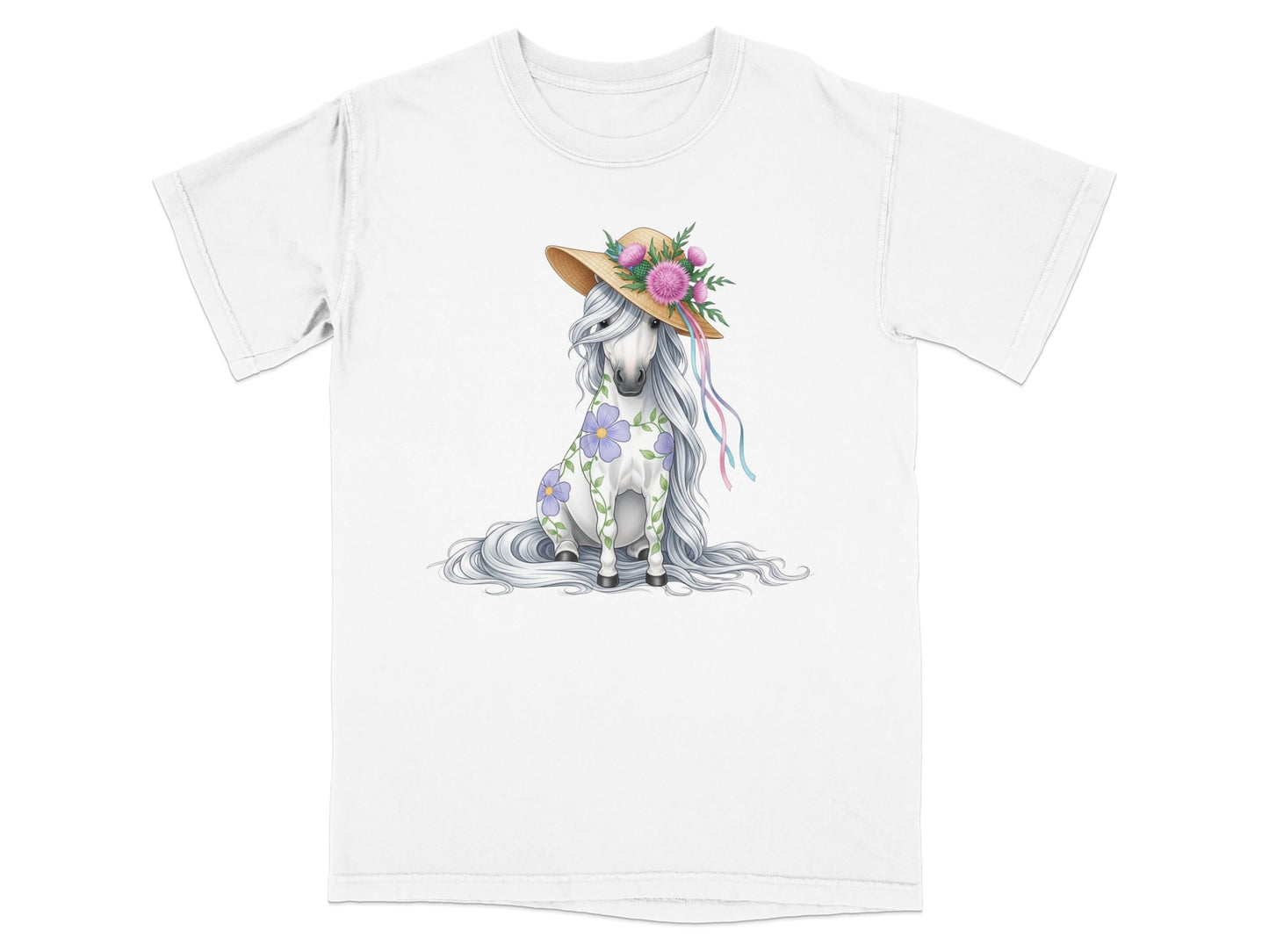 White t-shirt with a seated unicorn wearing a straw hat with flowers.