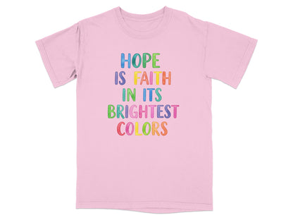 Pink t-shirt with "Hope is Faith in its Brightest Colors" text.