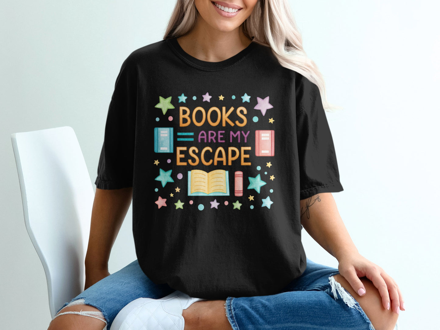 Black t-shirt with "BOOKS ARE MY ESCAPE" and book and star graphic.