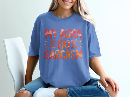 Blue t-shirt with "MY AURA IS 80% SARCASTIC" text in colorful font.