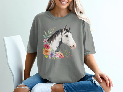 Horse head with colorful floral wreath on gray t-shirt.