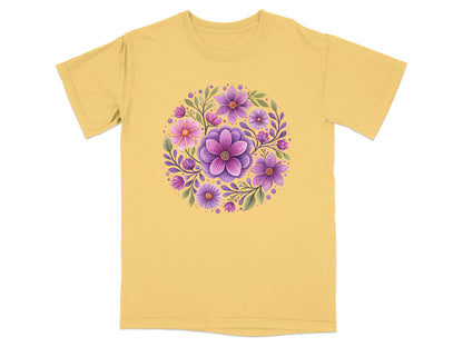 Yellow t-shirt with a circular floral design of purple and pink flowers.