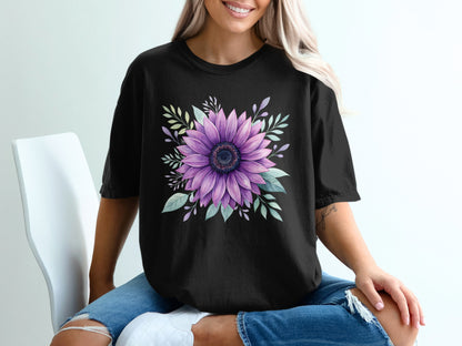 Black t-shirt with a large purple sunflower and green leaves graphic.