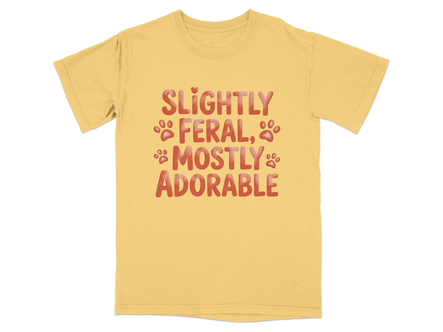 Yellow t-shirt with "Slightly Feral, Mostly Adorable" in playful font.