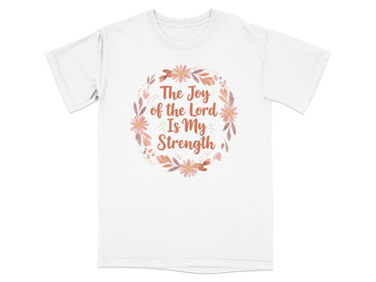 White t-shirt with "The Joy of the Lord Is My Strength" text and floral wreath.
