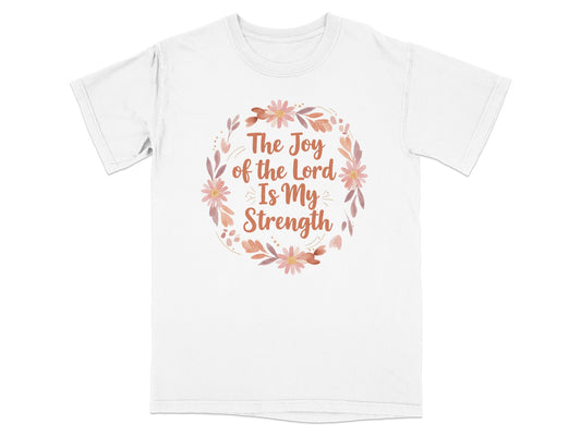 White t-shirt with "The Joy of the Lord Is My Strength" text and floral wreath.