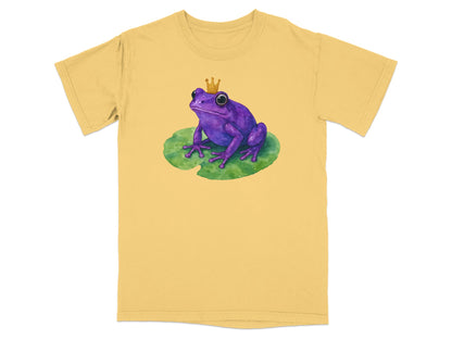 Purple frog wearing a crown sits on a green lily pad.